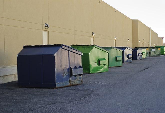 dumpsters ready for construction waste removal in Gloster